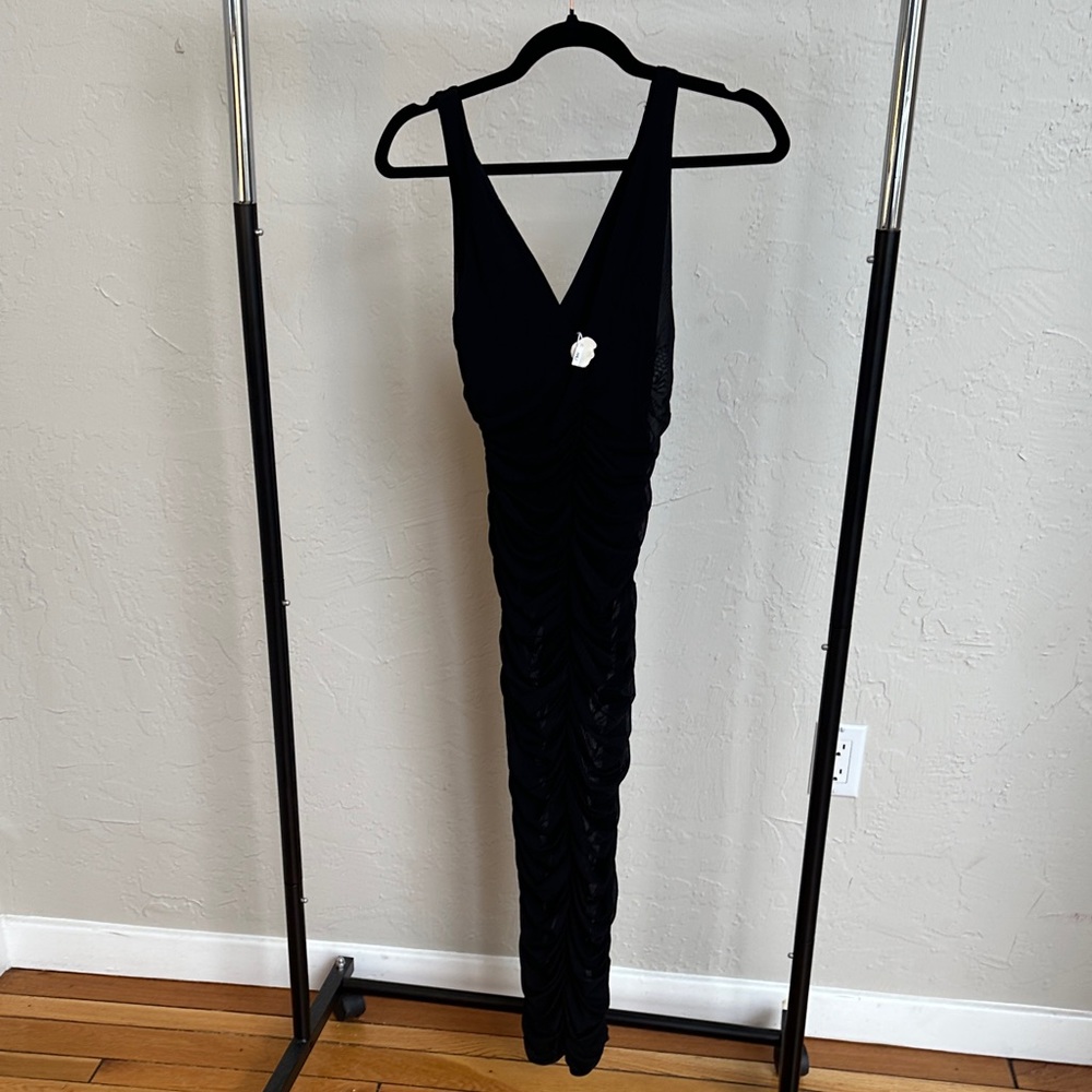 Gorgeous sleeveless black see through dress